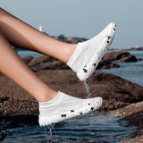 White Aquasoft beach shoes