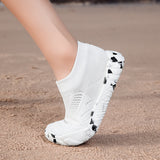 White Aquasoft beach shoes
