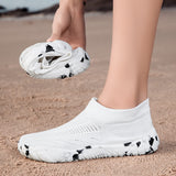 White Aquasoft beach shoes