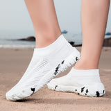 White Aquasoft beach shoes