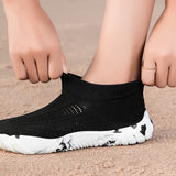 Black Aquasoft beach shoes